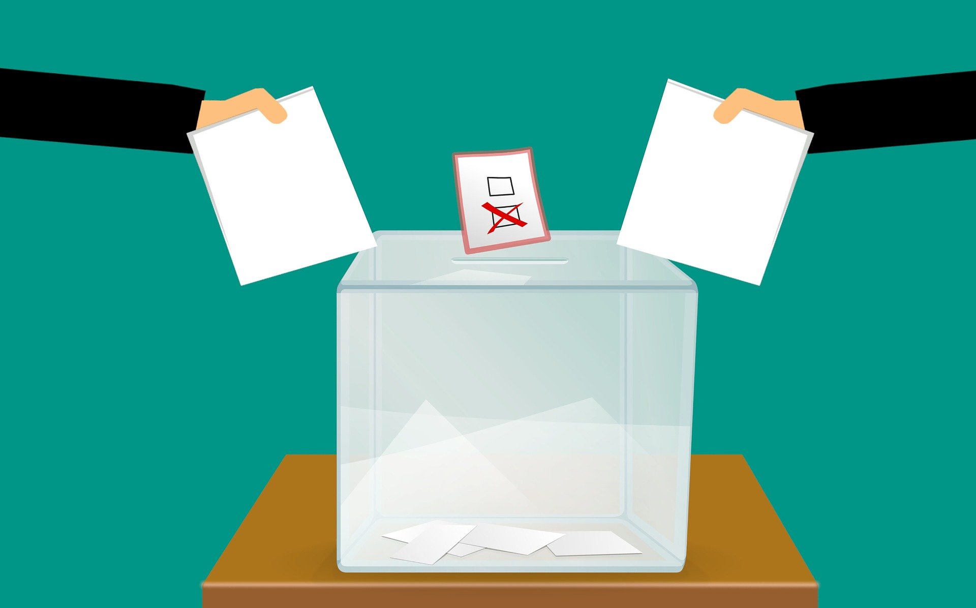 Grafik. Eine Wahlurne mit Stimmzetteln © Mohamed Hassan auf Pixabay